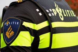 Verdachte aangehouden met vuurwapen, politie lost waarschuwingsschot