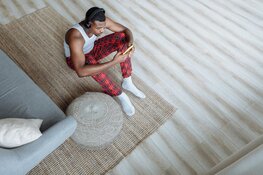 De ideale slaapzolder creëren met slimme lichtinval en zachte vloerbedekking